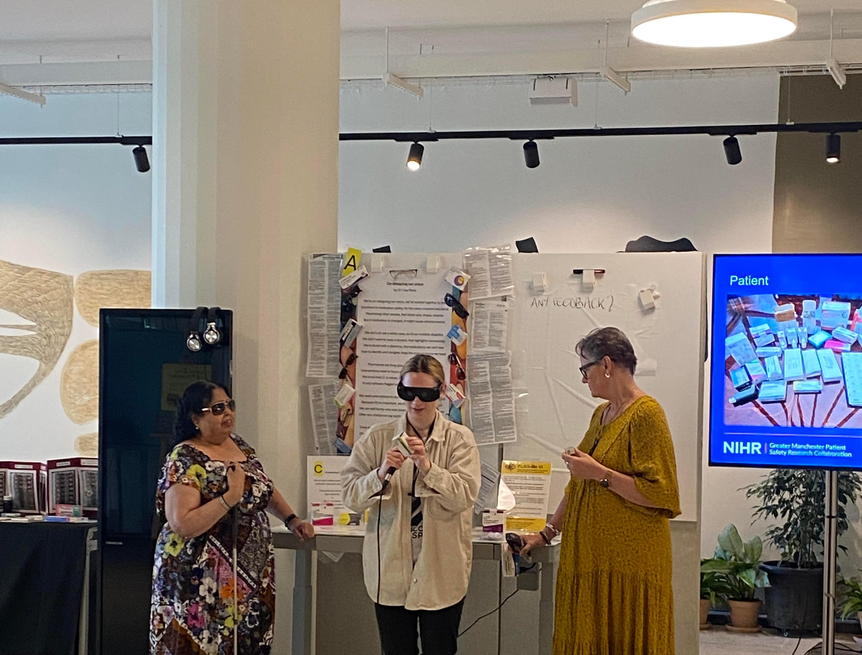 person trying sunglasses on for visually impaired