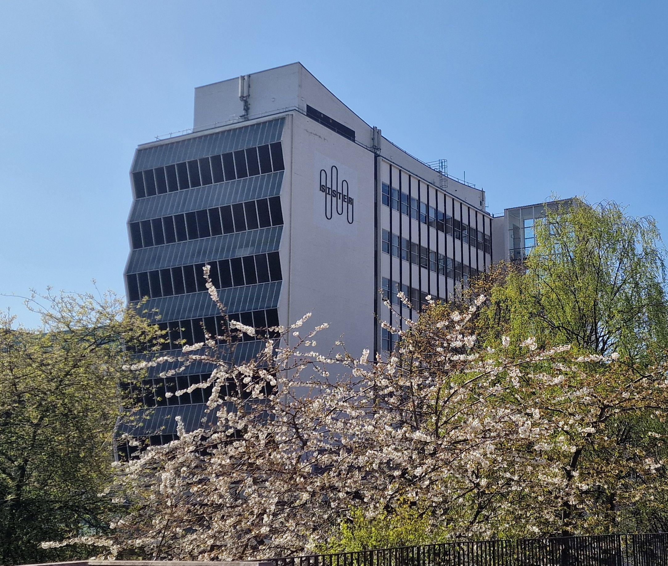 Exterior of the Renold buidling with the Sister logo on display