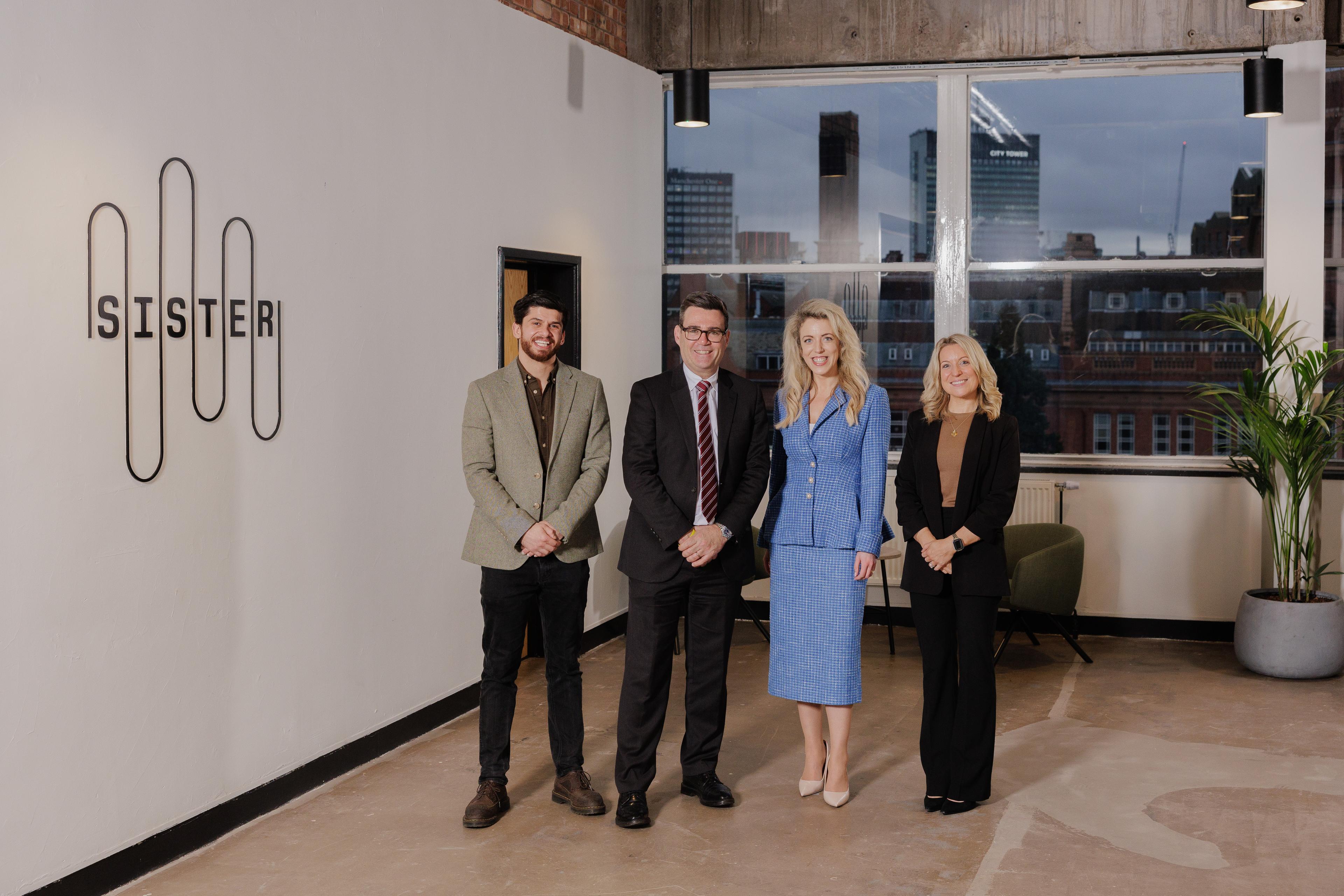 4 people standing formally 