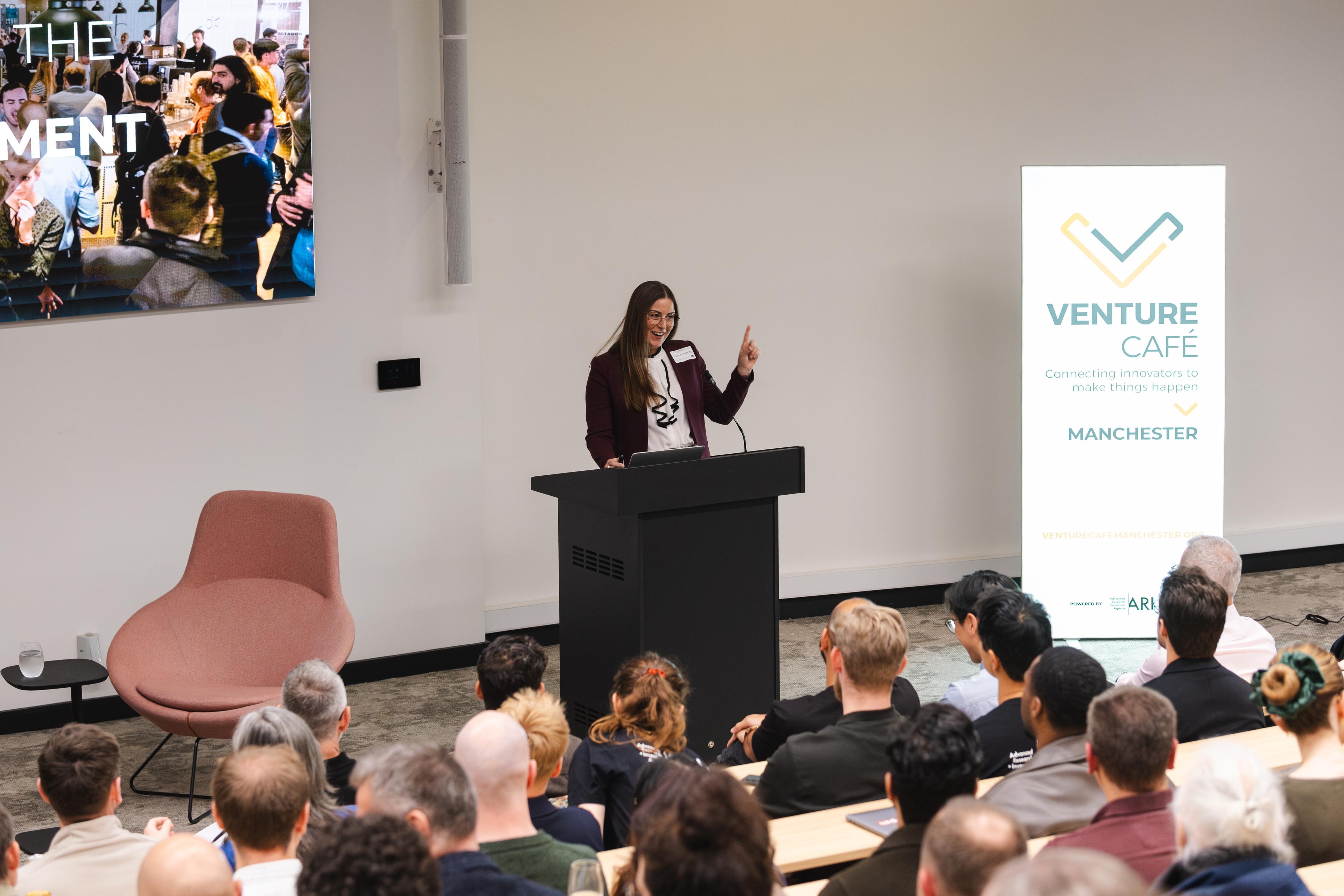 Woman talking venture cafe 