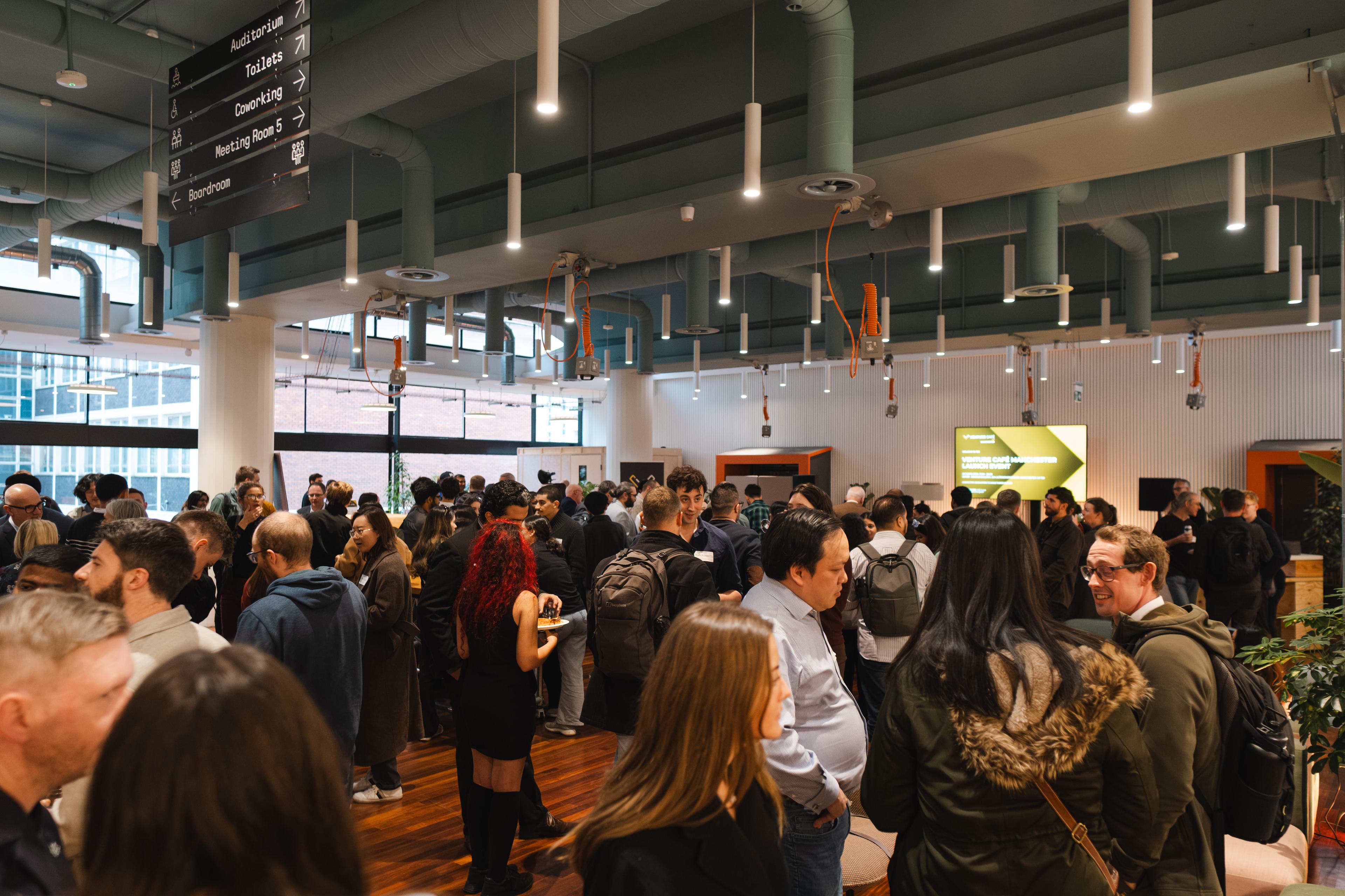 Flexspace filled with people for a Venture Cafe event